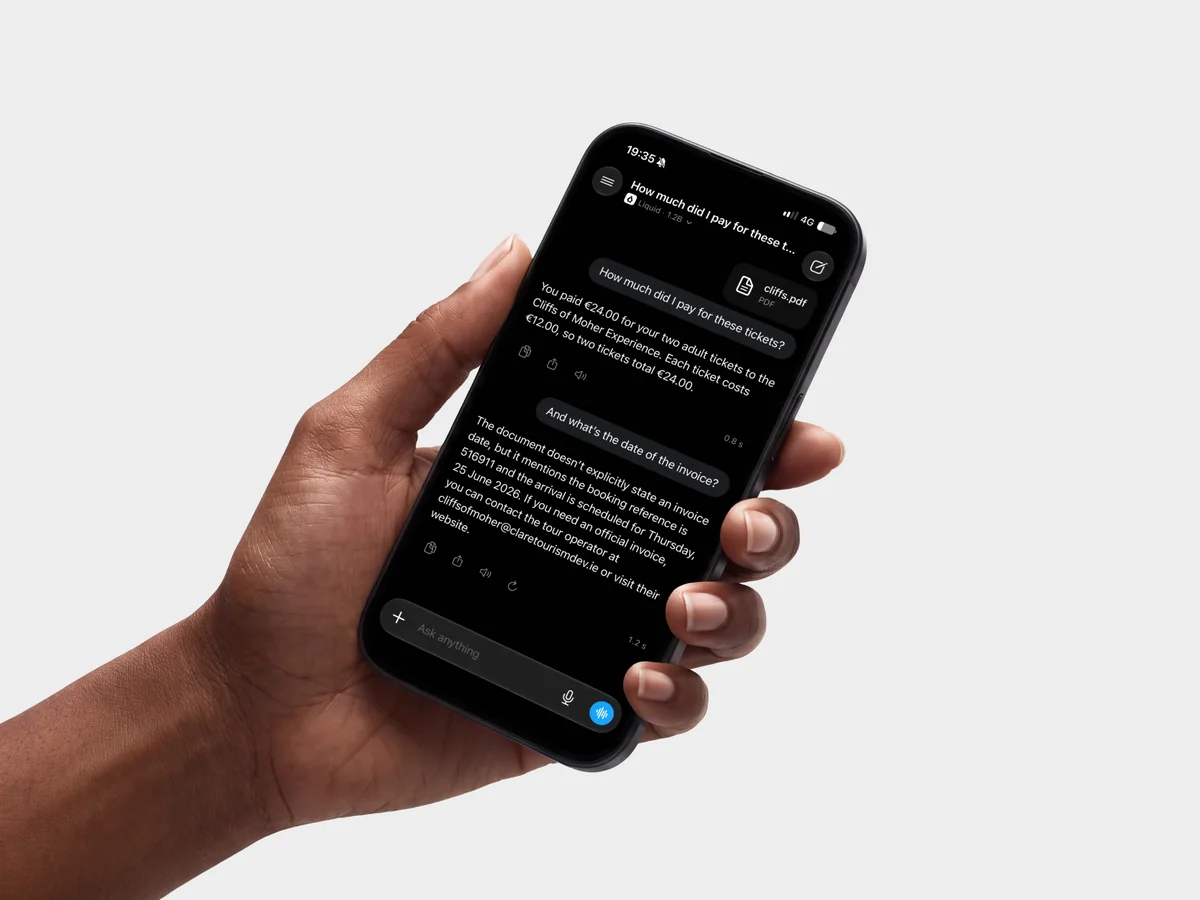 A person holding an iPhone with a Lapis conversation about a document.